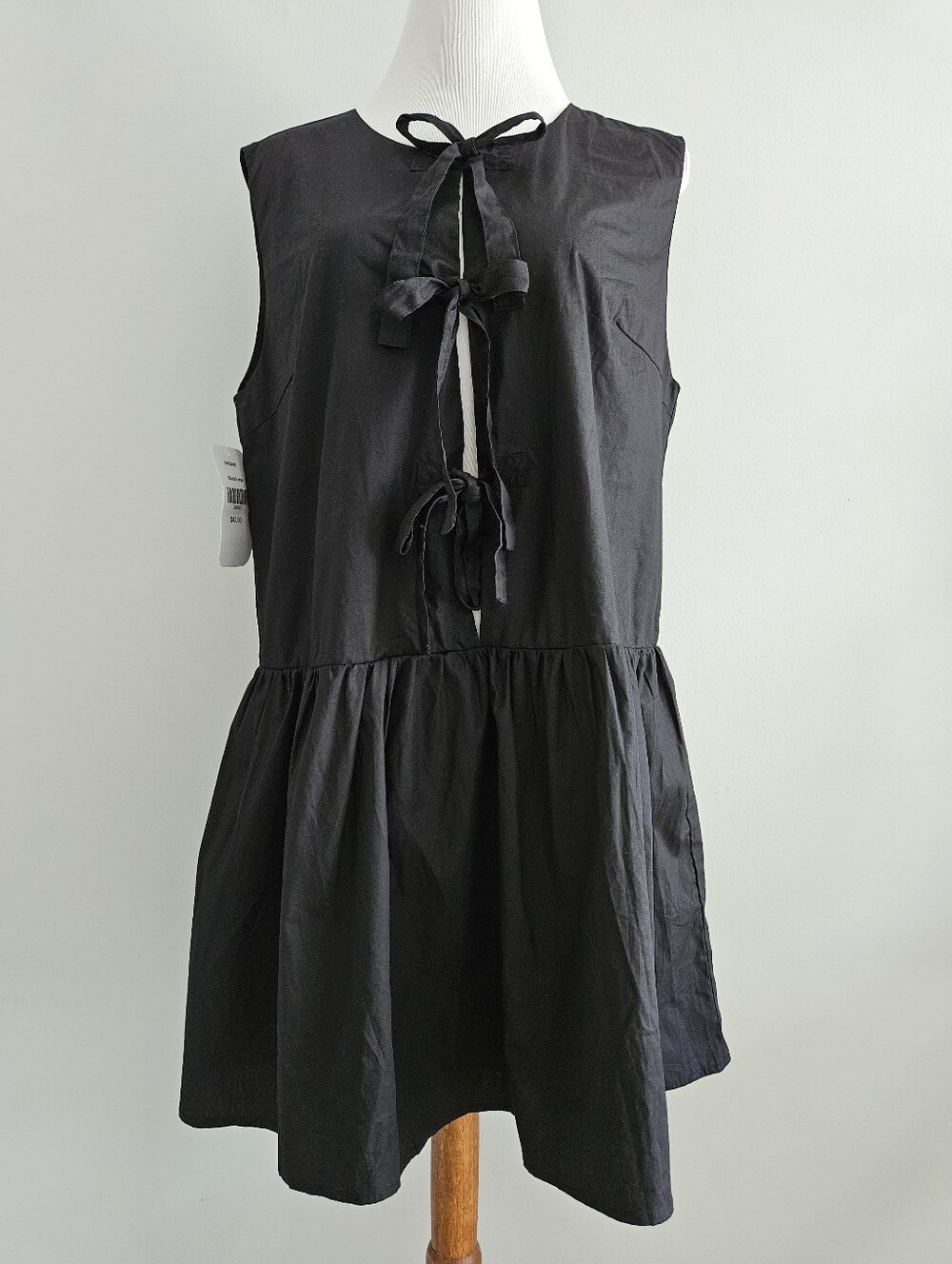 Lumiere | Black Sleeveless Tie-Front Babydoll Dress